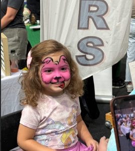 Little girl with face painted