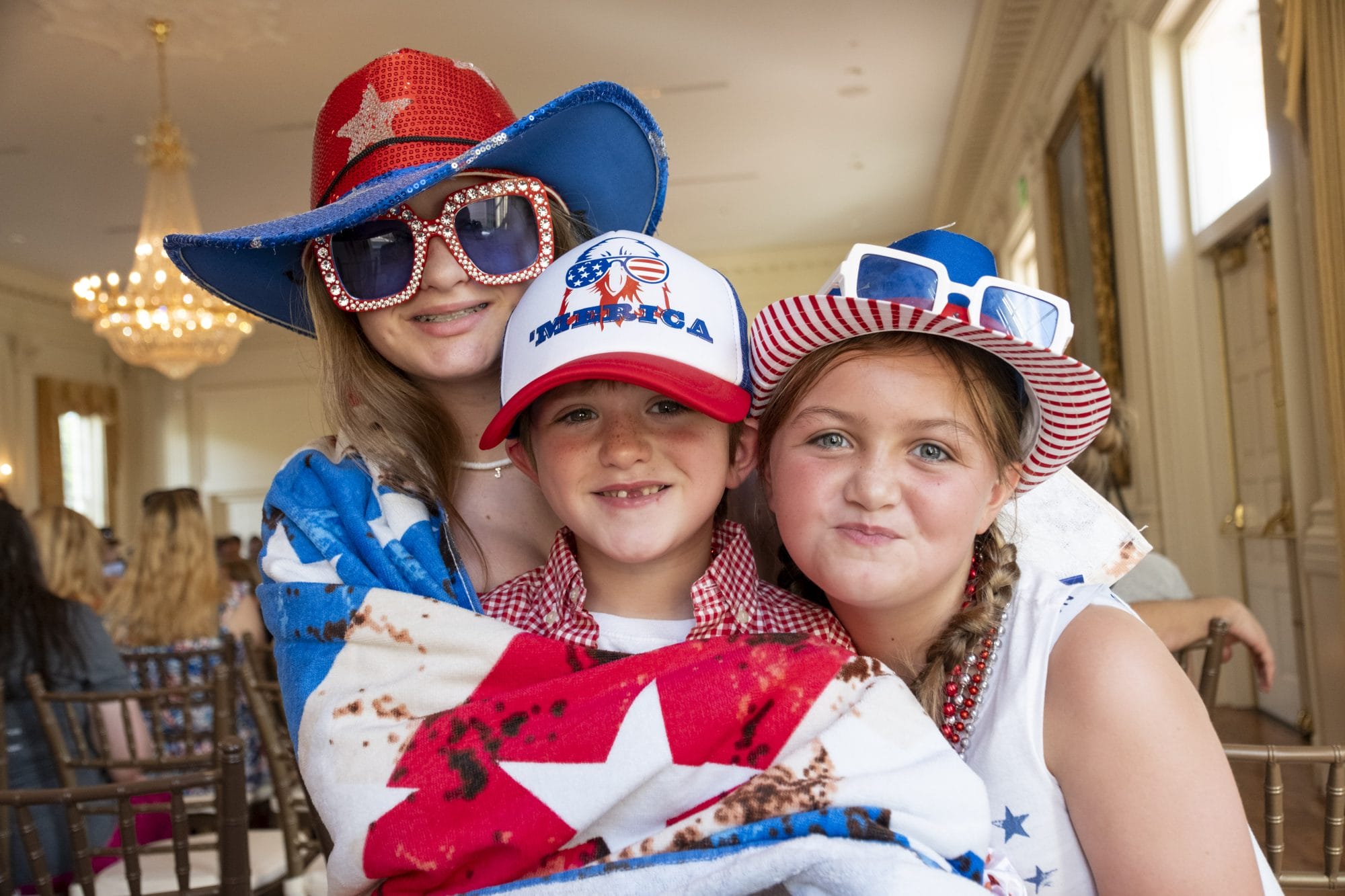 Kids in red white and blue gear