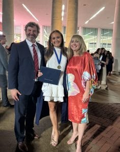 Walt Hannah and Bay at college graduation