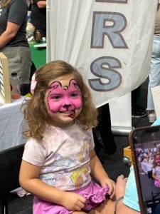Little girl with face painted
