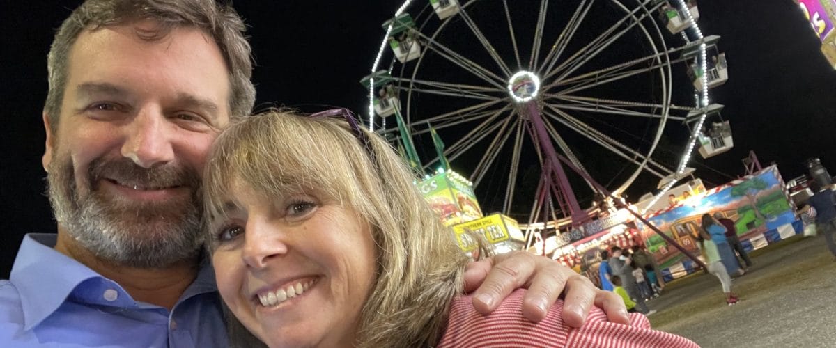 Walt and Hannah in front of ferris wheel