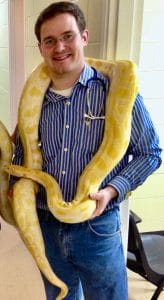 Joshua at work with snake