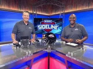 Sheldon Haygood and JehJeh Pruitt at anchor desk