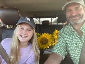 Walt and Banks with sunflower