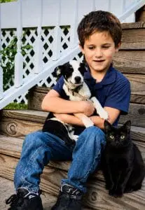 Joshua with Hooch and Kitty