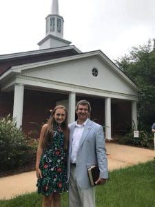 Bay and Walt in front of church