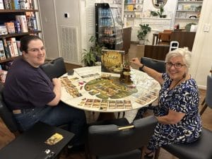 Women playing game at Tabletop Games
